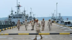 نیروهای دریایی کامبوج در اسکله پایگاه «ریم» که در خلیج تایلند واقع شده، گشت می‌زنند 