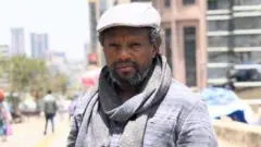 ጋዜጠኛ ተመስገን ደሳለኝ 