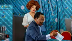 Paul Biya, 92, post im ballot as im wife Chantal, 54, dey look