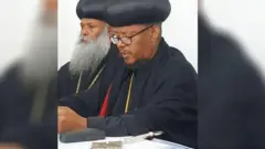 Abbaa Saawiroos waahillan isaanii waliin