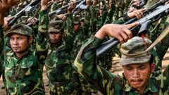 Members of the Ta'ang National Liberation Army, part of the Brotherhood Alliance, training at a base in Shan state in western Myanmar