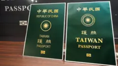 Taiwan unveils its new passport, right, which has the word Taiwan larger and the words Republic of China smaller