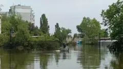 Улицы улиц городской школы корабля после подрыва гидроэлектростанции Каховской, 2023 г.