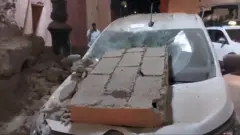 Debris falls on car after deadly earthquake in Morocco