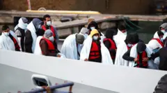 ኣብ መትረብ እንግሊዝ ዝደሓኑ ስደተኛታት