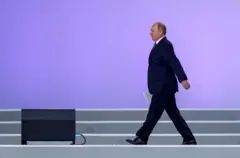 путін