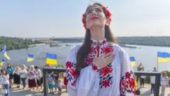 україна