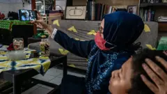 family talking on phone
