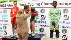 Vice President, International Cycling Union, Waghih Azzman give South Africa Cyclist Gold medal