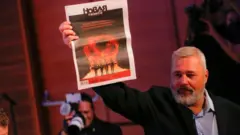 Umunyamakuru w'Umurusiya Dmitry Muratov afite icyapa