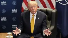 Mark Rutte and Donald Trump dey siddon