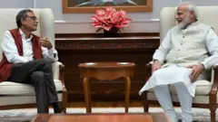 મોદી અને બેનરજી