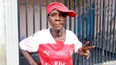 Di grandma wey be arsenal fan