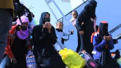 በቦሌ የደረሱ ስደተኞች