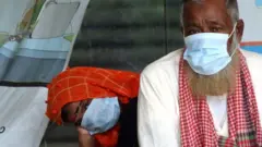 ঢাকায় একটা হাসপাতালে চিকিৎসা নিতে আসা ব্যক্তি