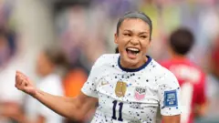 Sophia Smith celebrates