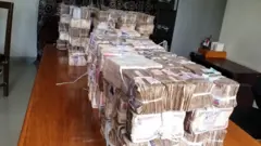 Plenti money ontop table