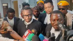 Omoyele Sowore and im Lawyer, Abubakar Marshal speaking to journalists afta court session on May 8, 2026