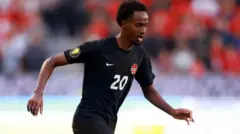 አሊ ለካናዳ ብሔራዊ ቡድን የተሰለፈበት ጨዋታ ላይ