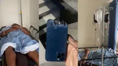 Man ontop hospital bed and one broken phone 