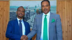 ሚኒስተር ዲኤታ ኣምባሳደር ምስጋኑ ኣርጋ ምስ ሚኒስተር ፋይናንስ ፑንትላንድ መሓመድ ፋራህ መሓመድ