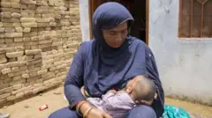 Haadha daa'ima hoosiisaa jiru