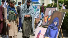 طالبان و نقاشی زن