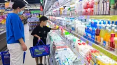 Buyers in supermarket