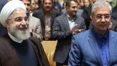 علی ربیعی و حسن روحانی