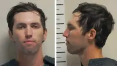 Two mugshots of 22-year-old Tyler Robinson, suspect of killing Charlie Kirk. In the left hand image, he is looking directly at the camera with a neutral facial expression.  In the image on the right, he is facing sideways to the camera, so that the left side of his face is visible. Robinson is Caucasian with brown hair, parted on the left side. He is clean shaven and is wearing a dark top.