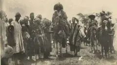 Aworan Alaafina kan pẹlu awọn ikọ rẹ