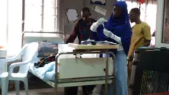 Student doctor wey dey prepare injection for patients