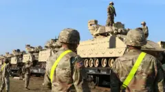 Американские военные и бронетехника в Литве