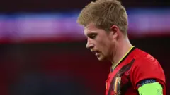 Kevin de Bruyne is substituted while playing for Belgium against England