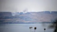 دود برخواسته از بلندی‌های اشغالی جولان پس از حمله راکتی حزب‌الله لبنان