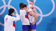 гимнасты