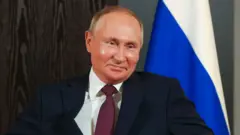 Путин