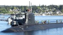 The USS Connecticut leaves port in 2018.