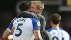 New Brighton boss Graham Potter celebrates his side's 3-0 win at Watford