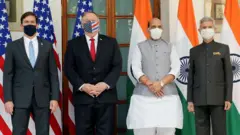 अमरीकी रक्षा मंत्री मार्क एस्पर और विदेश मंत्री माइक पोम्पियो, भारत के रक्षा मंत्री राजनाथ सिंह और विदेश मंत्री एस जयशंकर