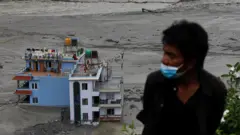बाढी
