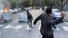 manifestante en Irán