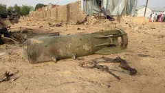 Graphic content of one bomb from air strike by di Nigerian airforce lie down for ground afta cross fire between di military and Boko Haram Islamists for Maiduguri, on April 27, 2018