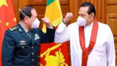 China defence minister with PM Mahinda Rajapaksa