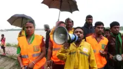 Cyclone Preparedness Programme (CPP) officials urge people to evacuate their homes in preparation for Cyclone Bulbul in Khulna on 9 November 2019