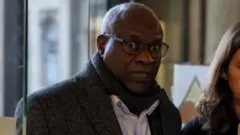 Rwandan doctor Sosthene Munyemana