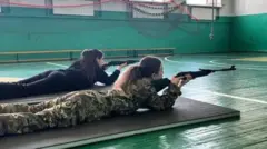 Russia's youth military organisation Yunarmia now operates in occupied regions of Ukraine, including Zaporizhzhia, where these girls live