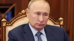 Путін