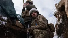 Ukrainian soldiers in trenches near Luhansk