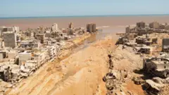 The failure of two dams sent a torrent of water through Derna, washing entire streets into the sea